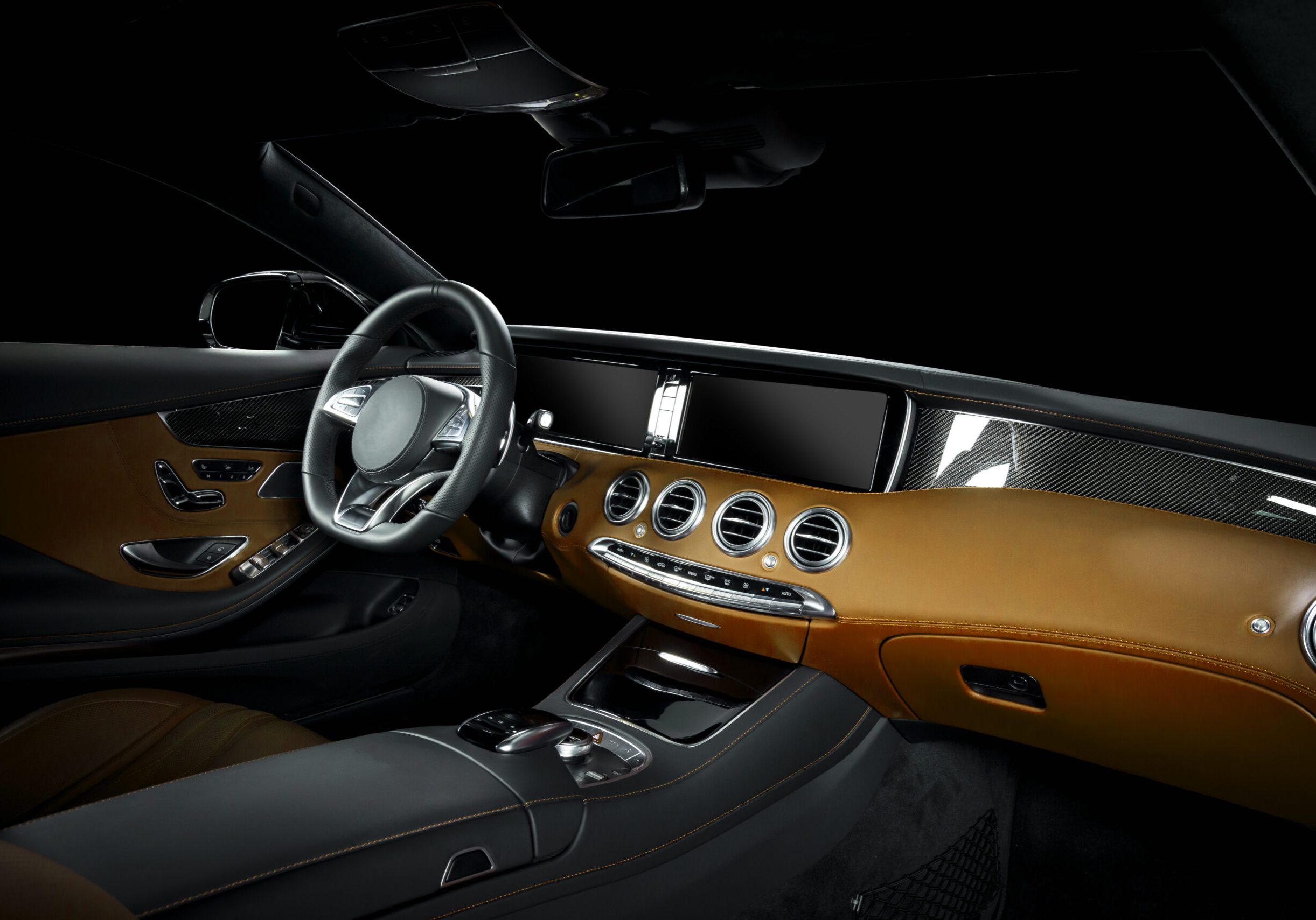 yellow leather interior luxury car inside - steering wheel, shift lever and dashboard